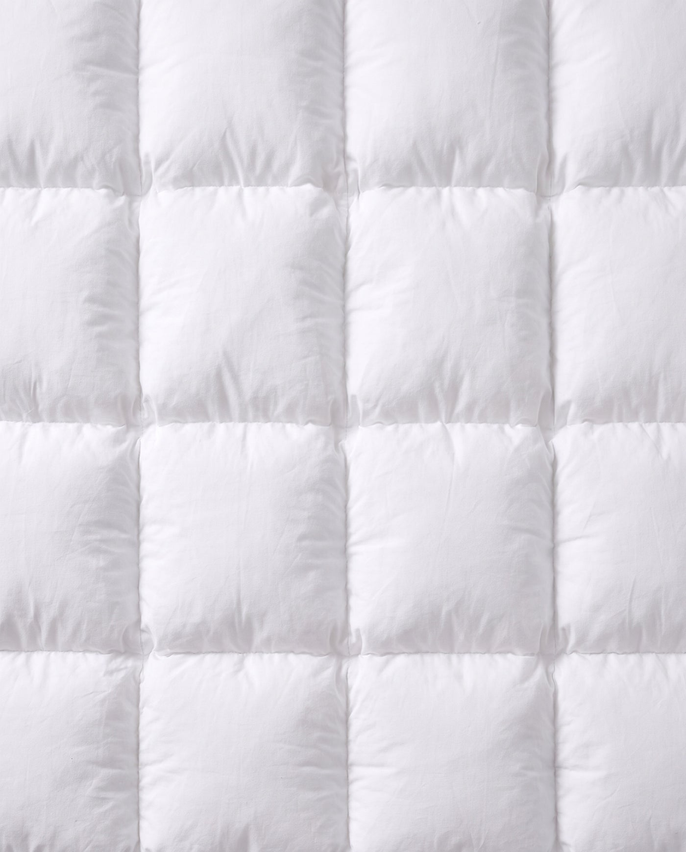 The surface up close — cotton over duck feather.