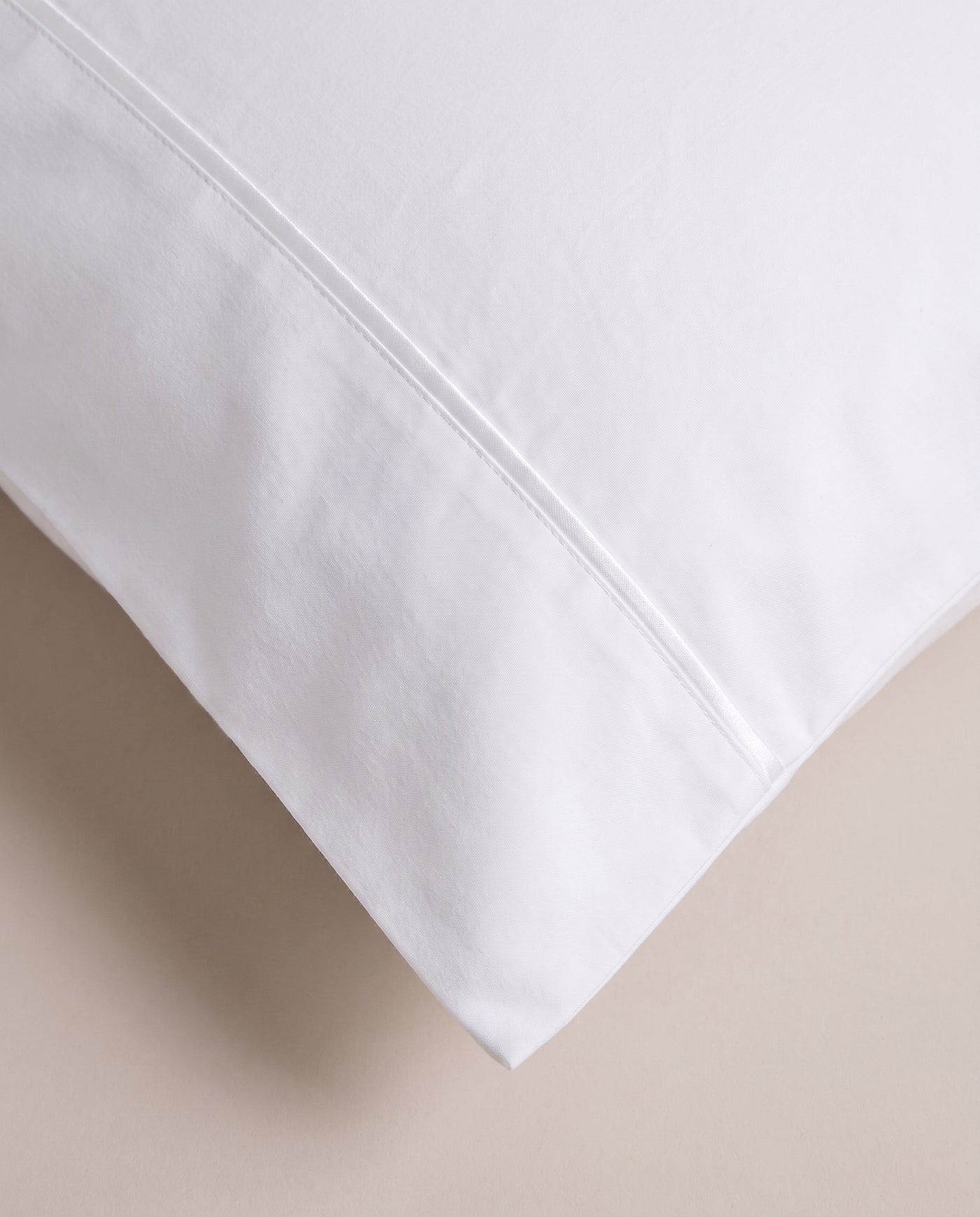 The weave up close — percale with a matte, dry touch.