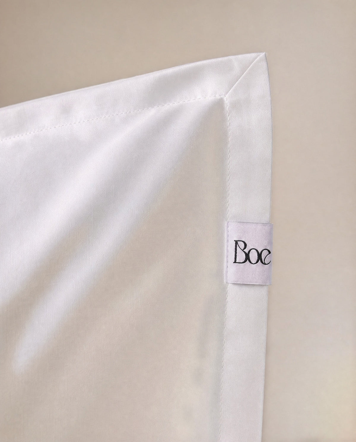 White Supima up close — a dense, lustrous weave.