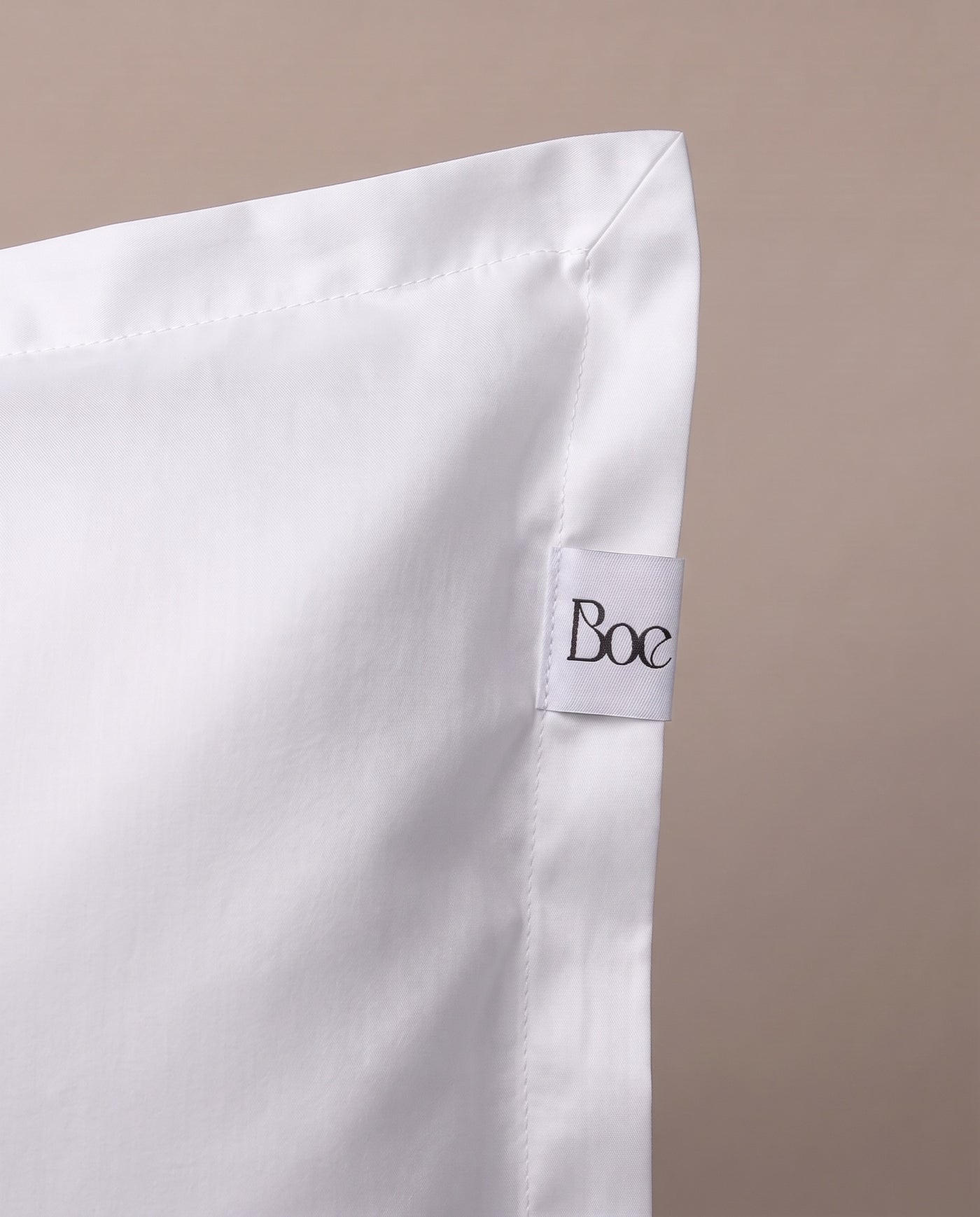 White Supima up close — a dense, lustrous weave.