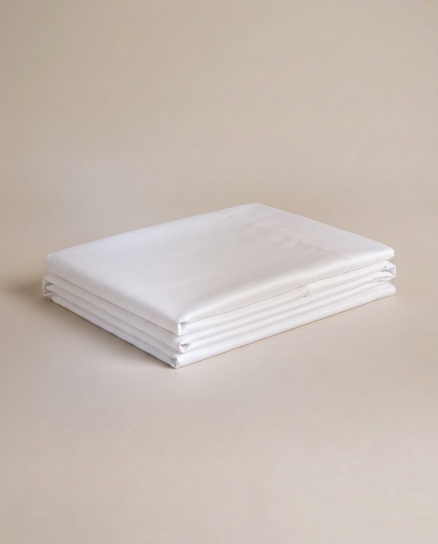 Folded white Supima — smooth and even.