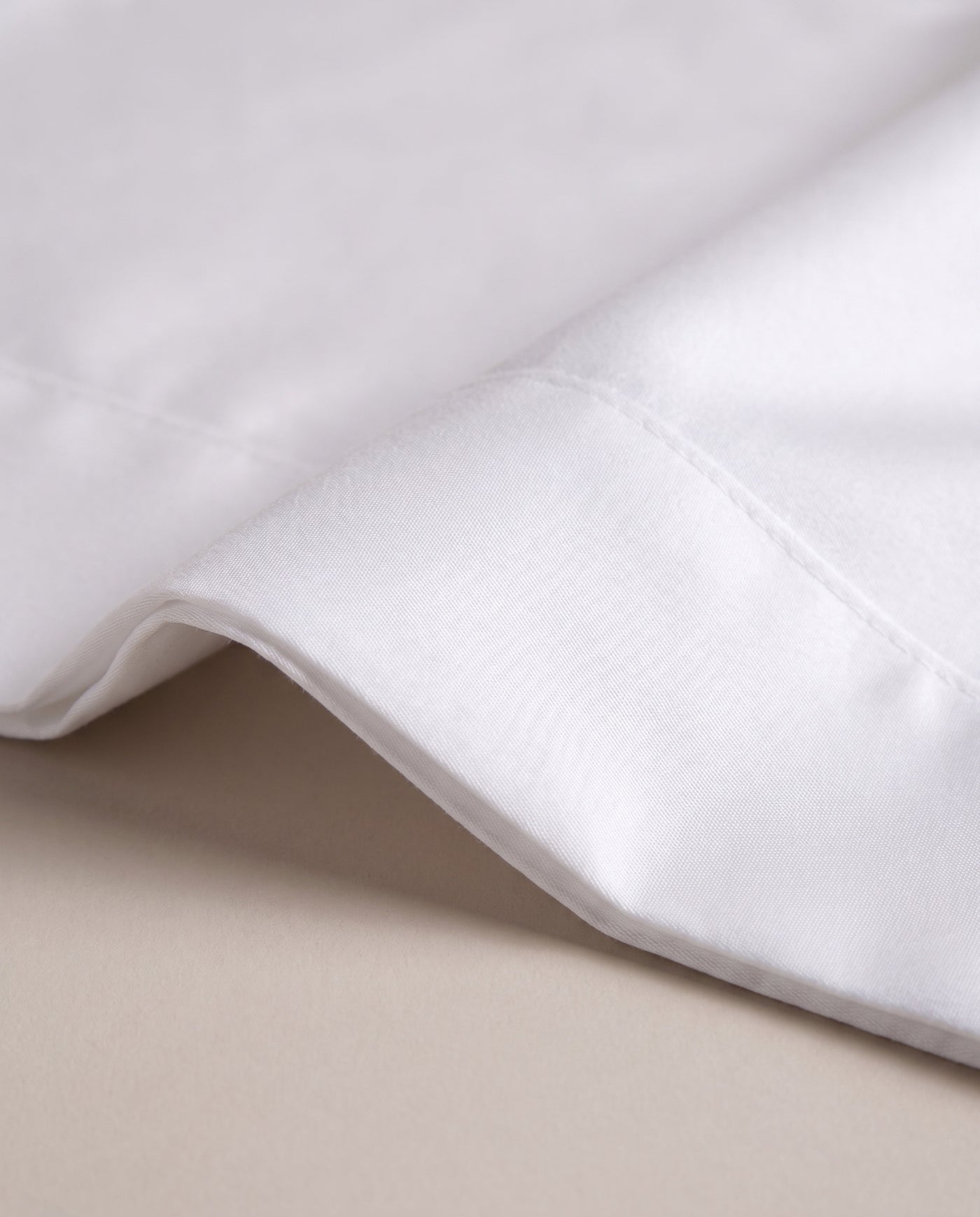 White Supima, up close — a soft lustre in the weave.