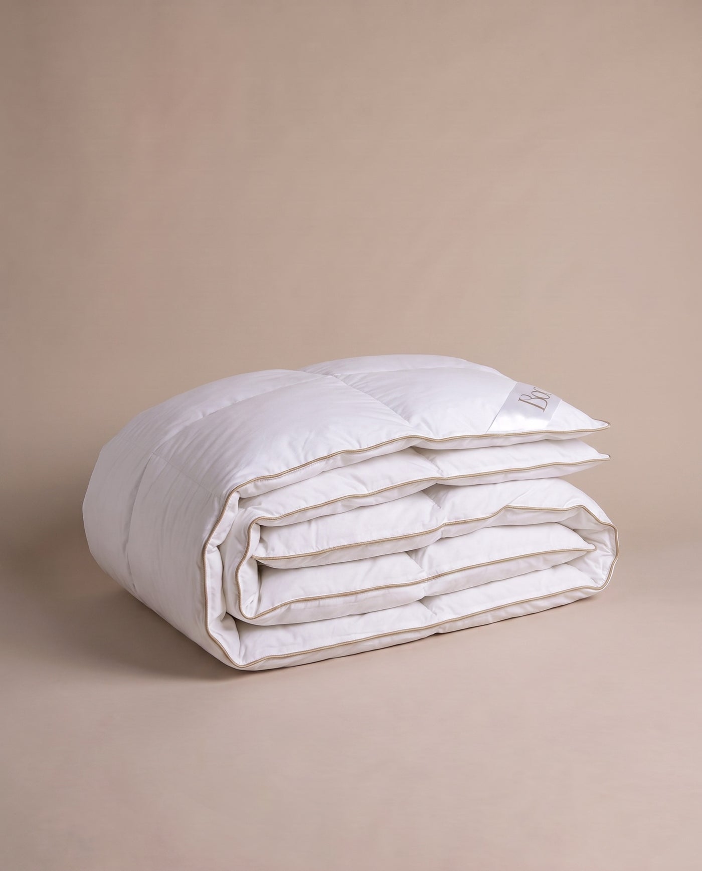 The duvet folded — 100% cotton shell.